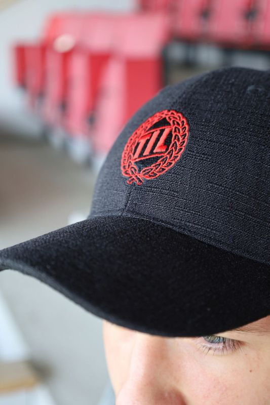 TIL Caps with red logo 